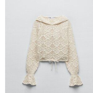 Hooded pointedly knit sweater